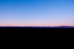 早朝に帯広市内からとらえた地上と空を分断する日高山脈（２０１０年、戸張さん撮影）.jpg