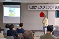 講演会中の池田専務理事・事務局長