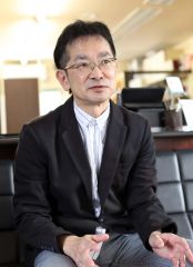 理容組合の活動を語る野村支部長（助川かおる通信撮影）