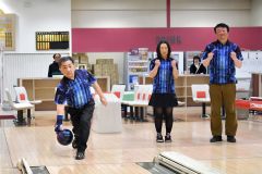 念願の初優勝に輝いたプロト警備保障。左から原修正、小松智美、阿部忠大