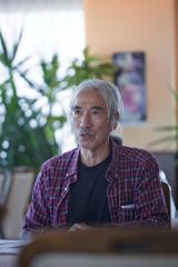 あいさつする土谷部会長