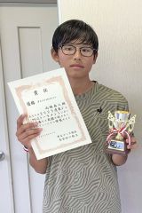 男子１６歳以下シングルスを制したウイングの高橋奏人