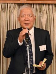 あいさつする山田会長

