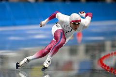 【男子500メートル】34秒83の好タイムで3位に入賞した村上右磨の滑り(金野和彦撮影)