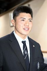 記者会見で抱負を語る能戸輝夢（大賀章好撮影）